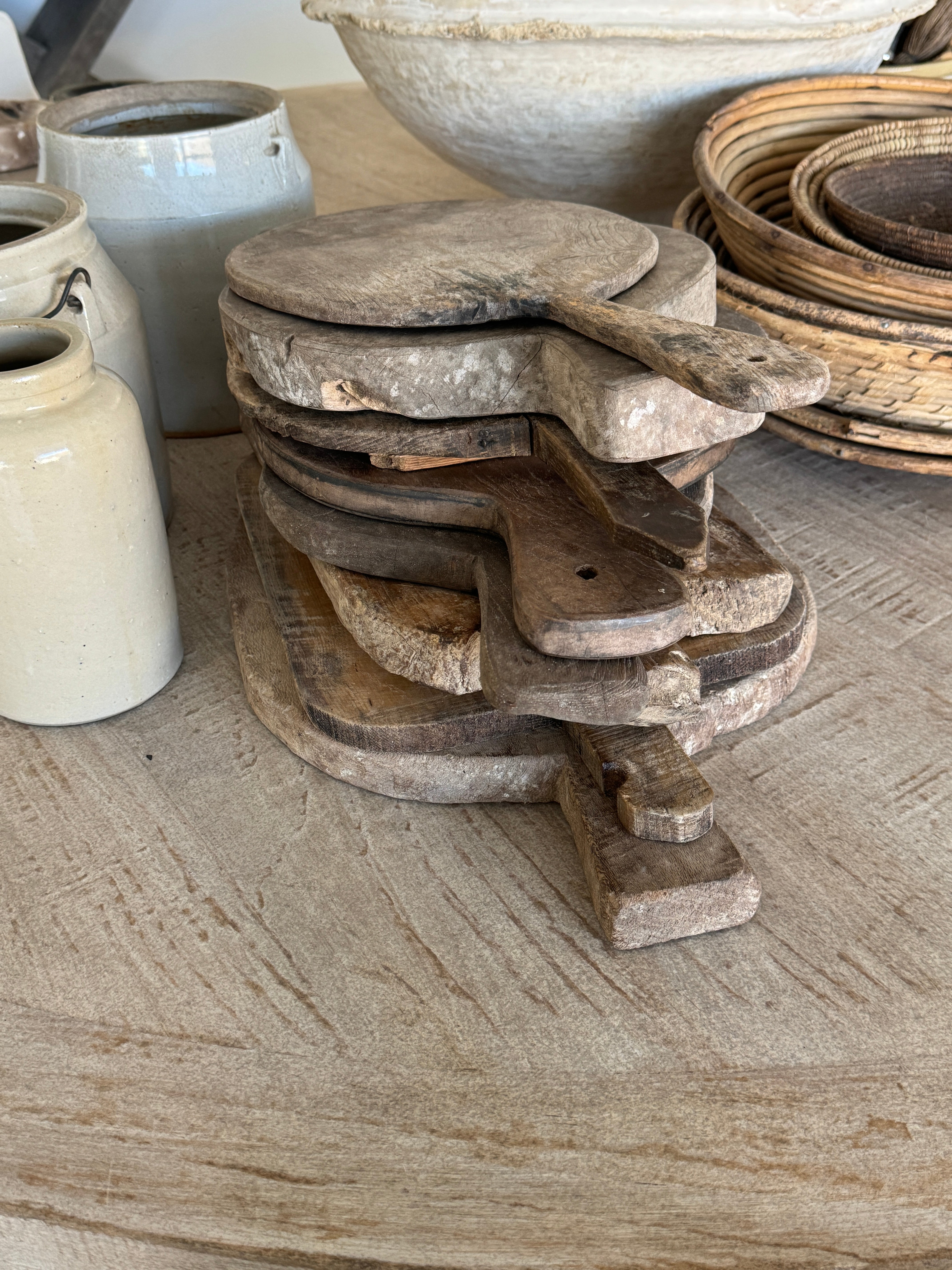 Stack of vintage and antique bread boards debra hall lifestyle
