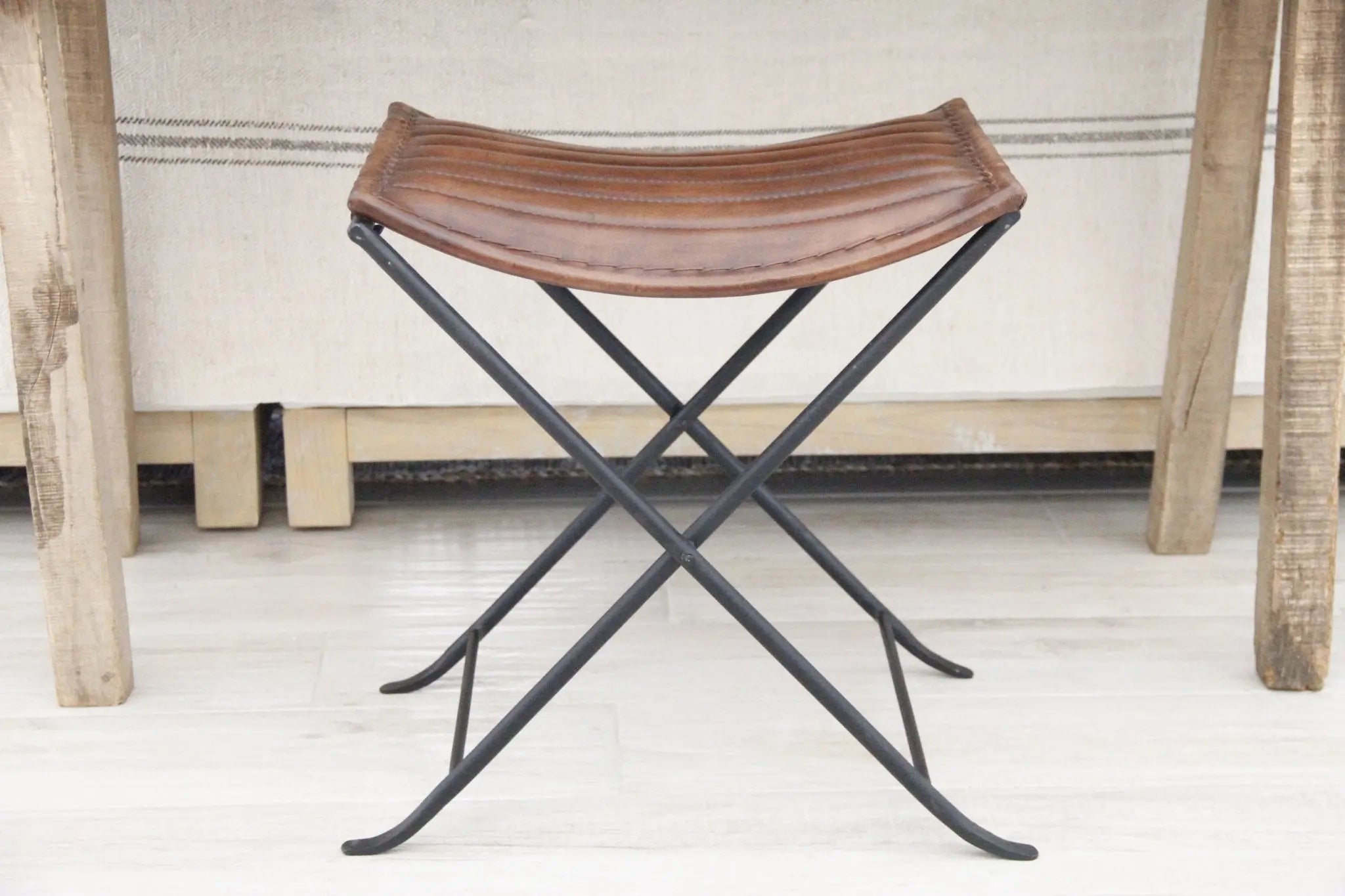 Brown Leather and Black Iron Folding Bench  Debra Hall Lifestyle