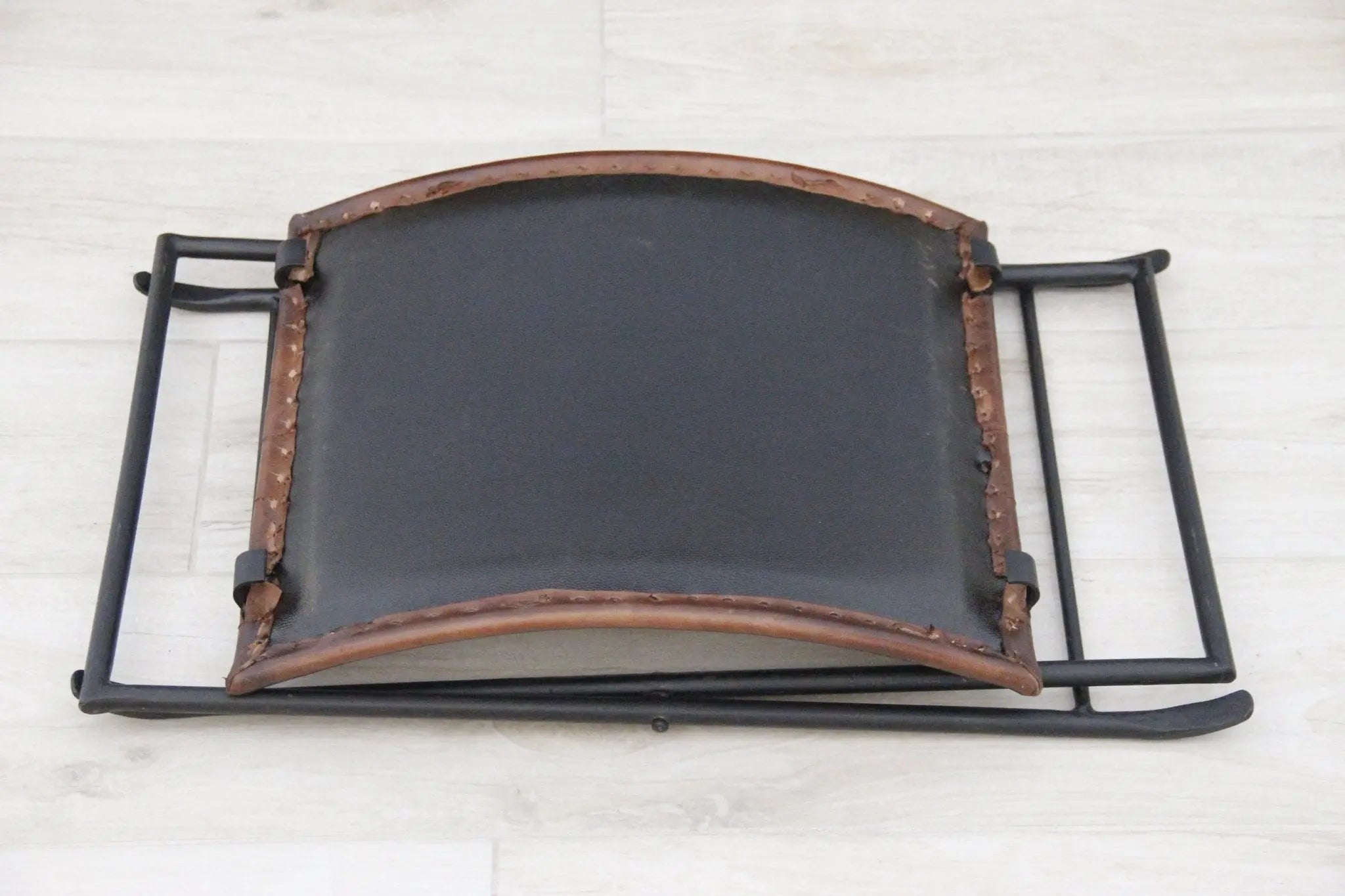 Brown Leather and Black Iron Folding Bench  Debra Hall Lifestyle