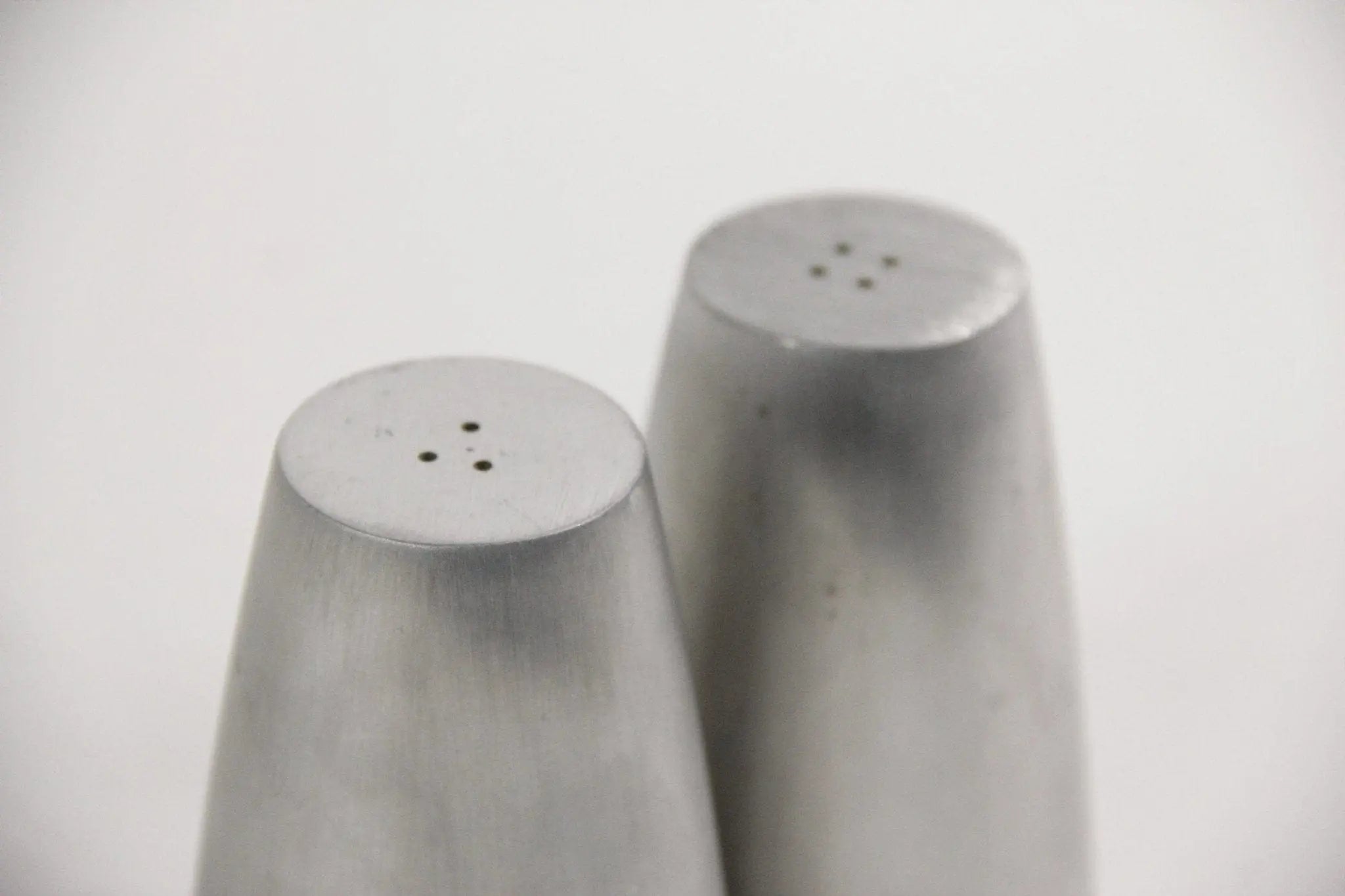 Michael Graves Salt & Pepper Shakers | Modernist Brushed Nickel  Debra Hall Lifestyle
