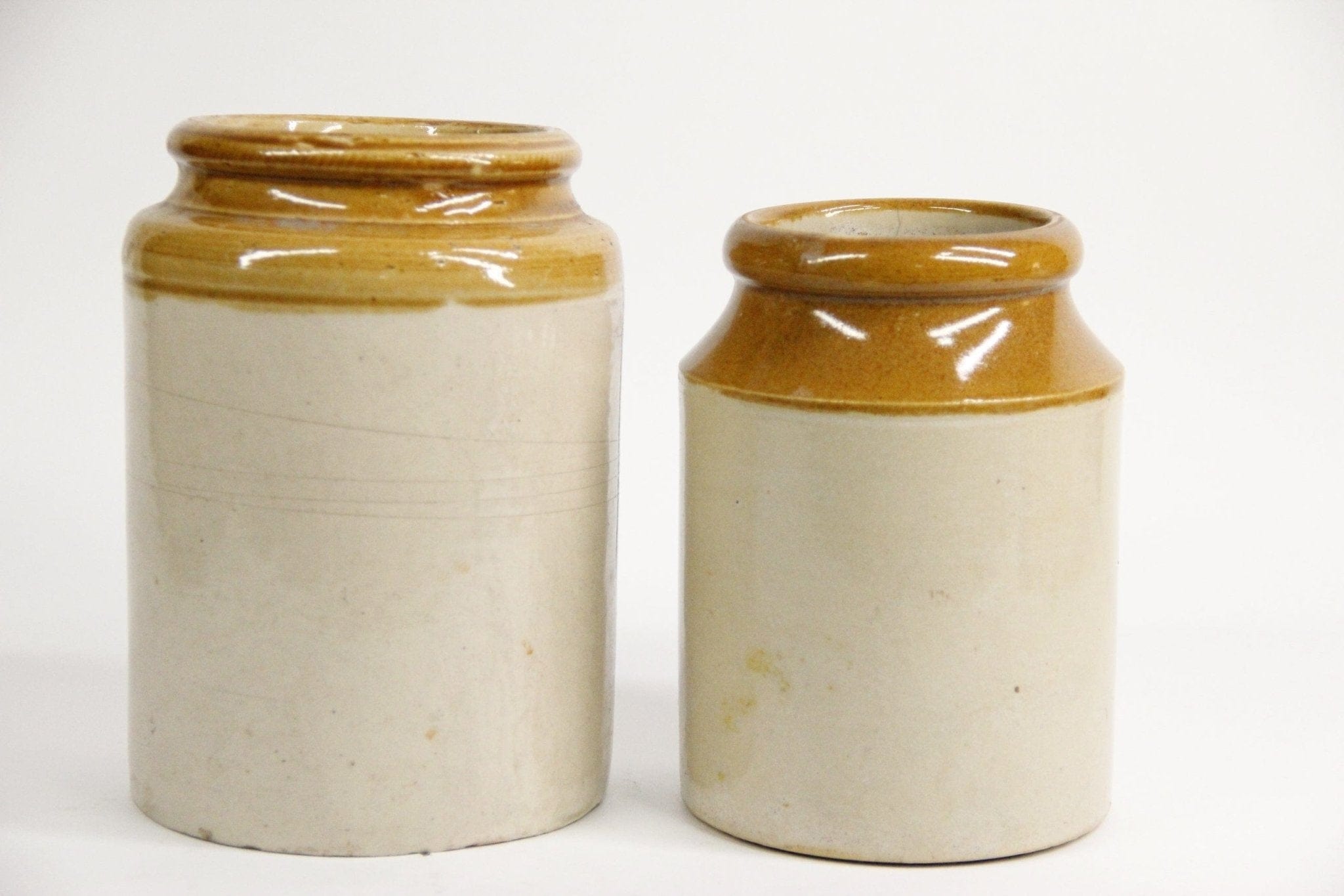 Antique Stoneware Canning Jars in Two Tone close